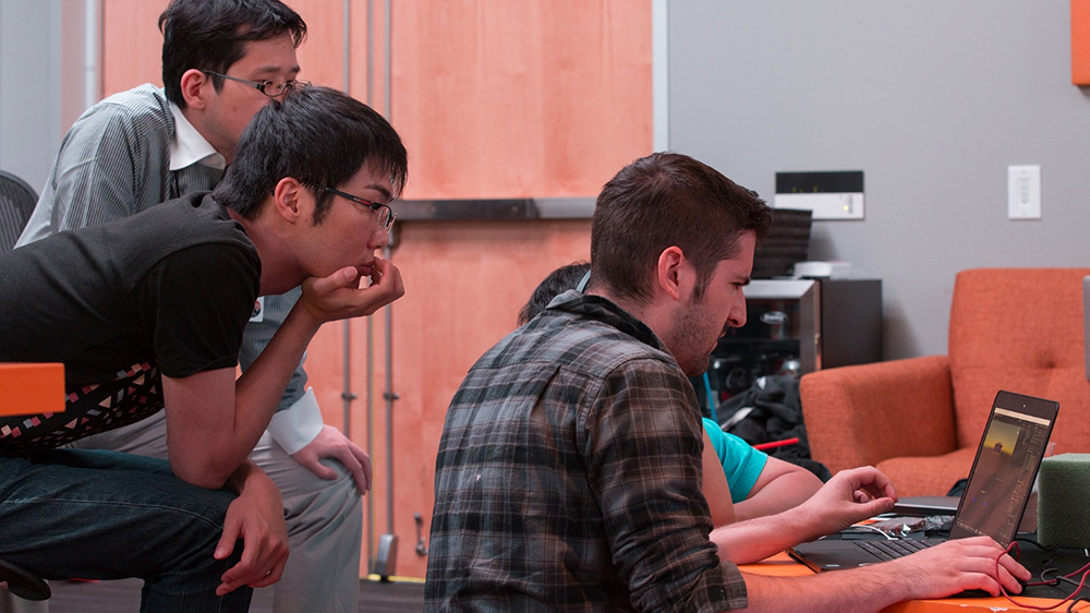 Teams working during a workshop in the Mixed Reality Academy