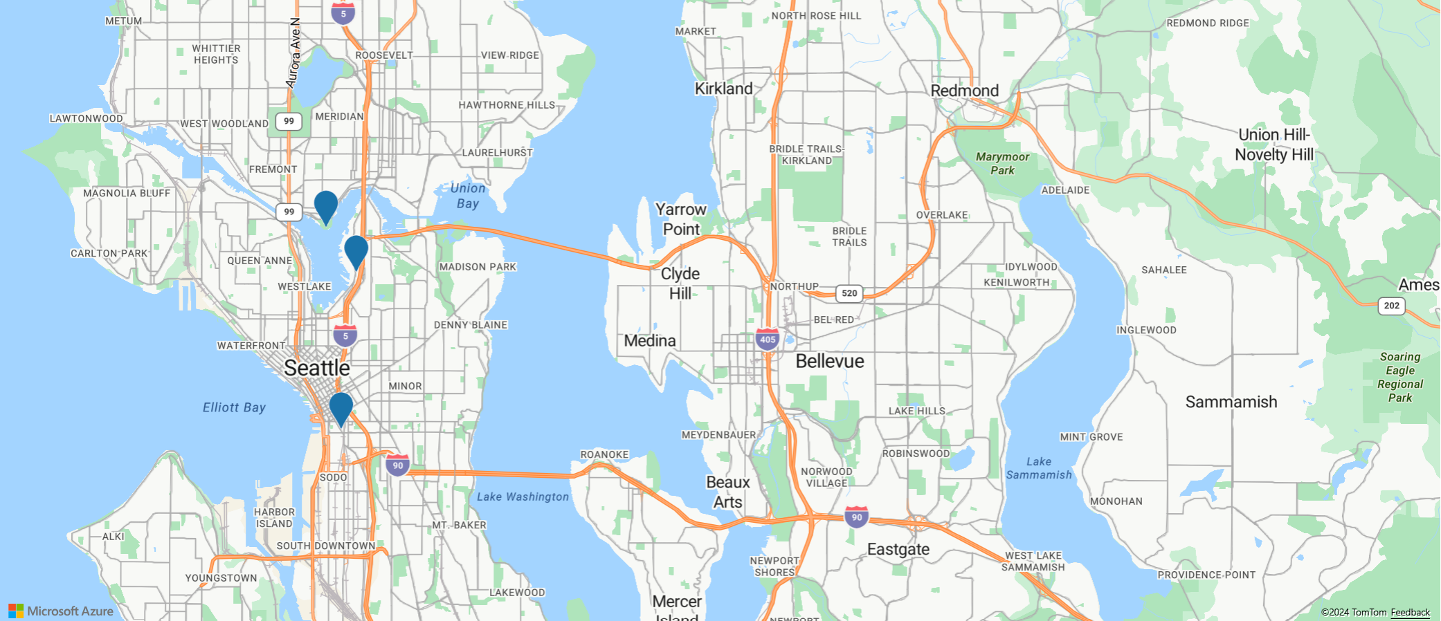 Captura de pantalla de un mapa de Seattle con tres marcas azules para demostrar cómo reutilizar las plantillas de elementos emergentes.