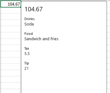 Tarjeta de tipo de datos que muestra los valores de las propiedades de bebidas, alimentos, impuestos y propinas.