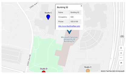 Captura de pantalla d'un marcador de mapa seleccionat en una aplicació del llenç, amb una targeta d'informació que mostra el nom de la ubicació, l'ocupació i les dades del telèfon.