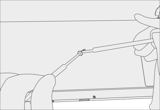 Photo that shows applying Loctite SF 7649 activator to new hinge screws prior to installation.