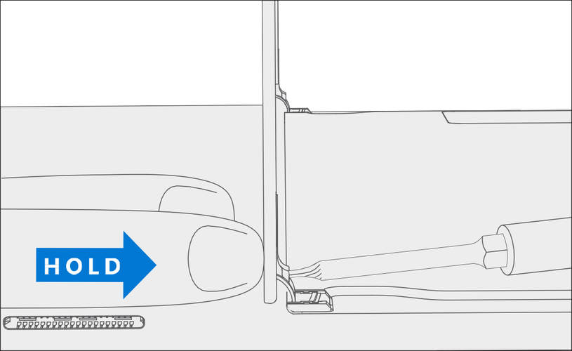 Photo that shows tightening the hinge screws while supporting the kickstand for proper alignment.