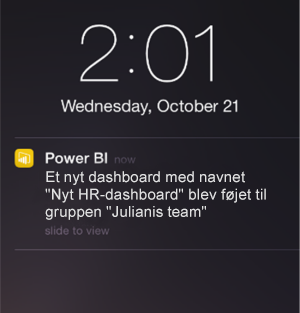 Skærmbillede af et dashboard, der viser en meddelelse på en i Telefon.