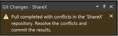 Screenshot of a merge conflict notification.