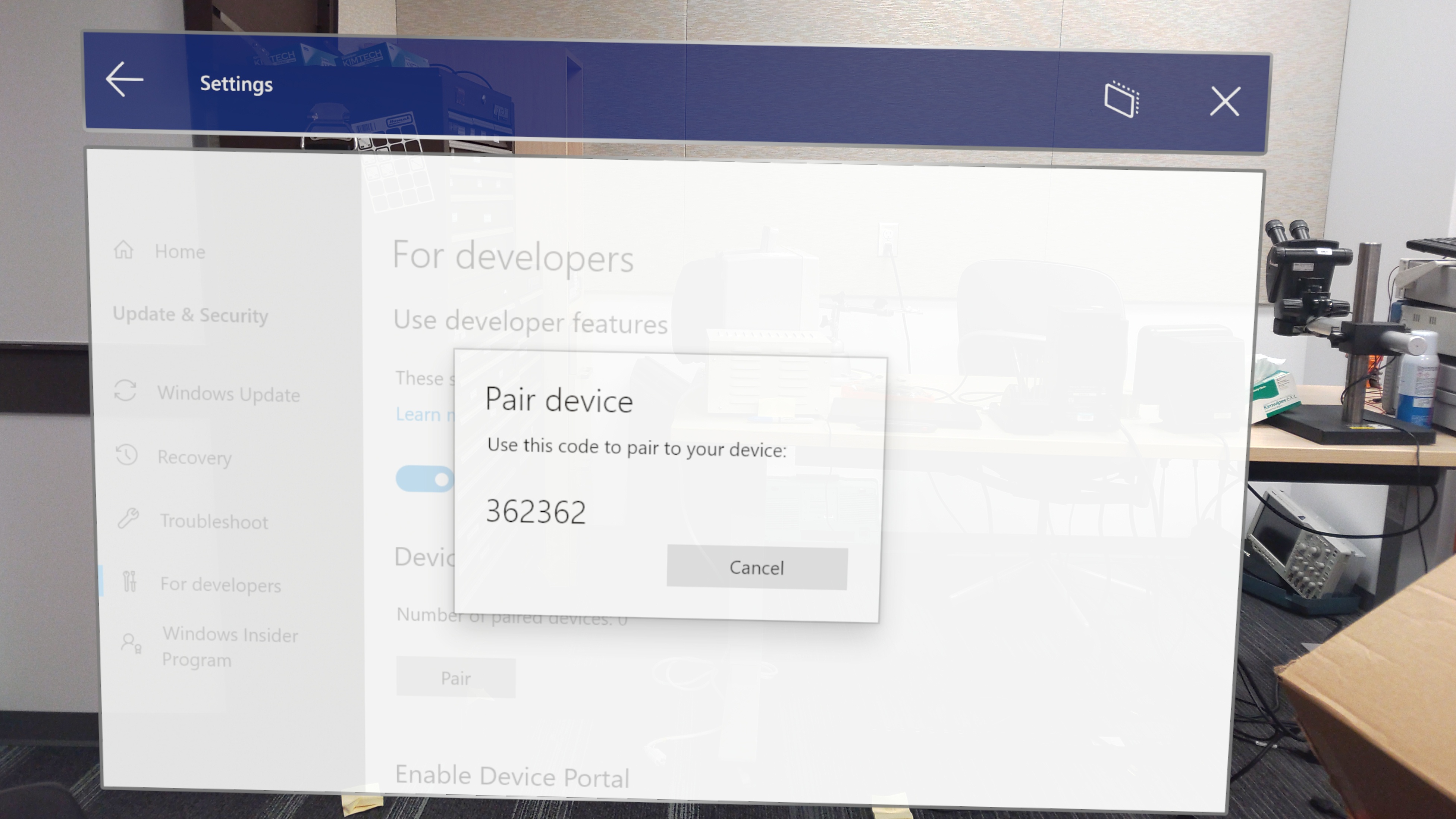 Screenshot: Popupfenster für kostenpflichtige Geräte mit hervorgehobenem Registrierungscode
