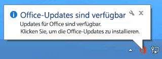 "Office updates are available" notification shown on the taskbar