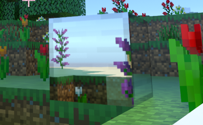 Eisenblock, der Blumen aus der Umgebung reflektiert