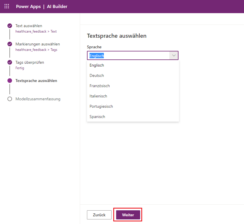 Screenshot des Kategorieklassifizierungsmodells in Power Apps Studio mit einer Dropdownliste von Sprachen, in der Englisch ausgewählt ist, und einer Hervorhebung von „Weiter“