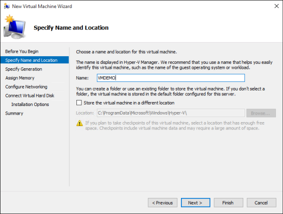Screenshot of the New Virtual Machine Wizard's Specify Name and Location tab with a focus on the Next option.
