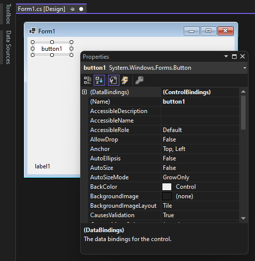 The Windows Forms designer in Visual Studio showing a button and the properties window