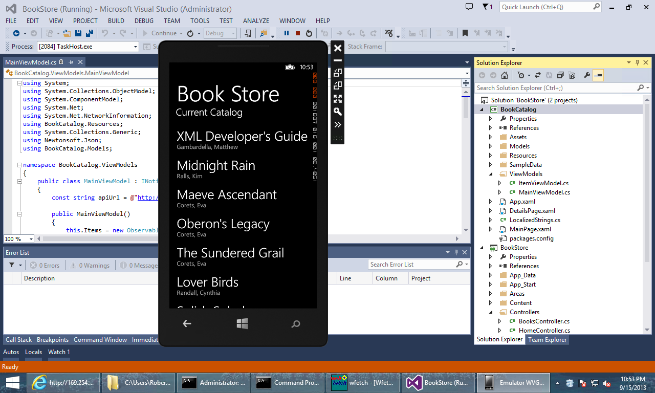 Screenshot of the solution explorer window, showing the phone emulator over it, displaying the Book Store with the titles in the catalog.