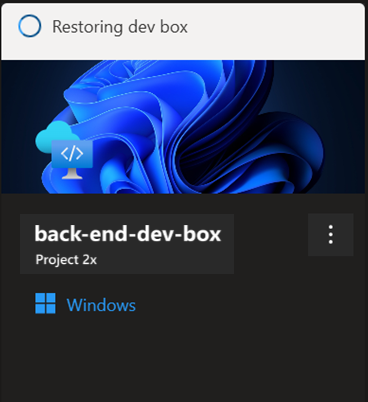 Screenshot of the developer portal, showing a dev box tile with the message Restoring dev box.