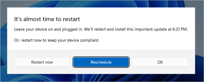 Screenshot of the dialog displayed in Windows 11 version 23H2, or later, for a user when a restart is needed for an update but the deadline isn't reached yet. The notification contains the deadline time and options to restart now or acknowledge the notification