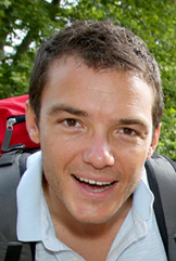 Photo of a man who is smiling.