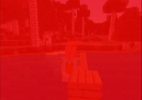 Image of a screen of Minecraft that has a red wash over the scene.