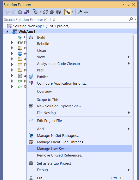 Screenshot shows how to select the Manage User Secrets option in Visual Studio.