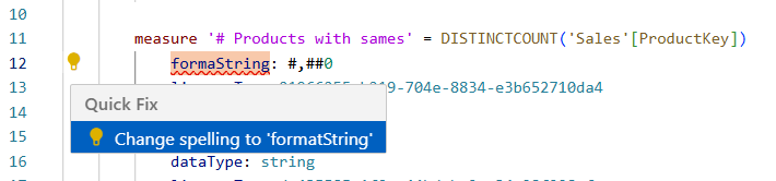 Screenshot of the TMDL view in the code editor showing a light bulb icon next to a squiggle, indicating available Code Actions like correcting property name misspellings.