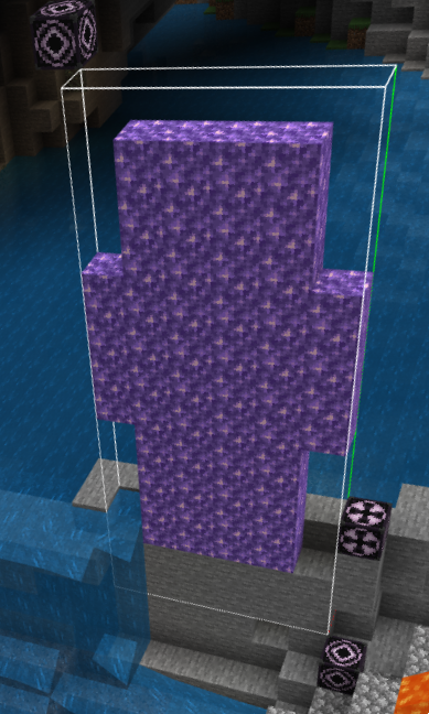 A statue surrounded in corner mode structure blocks.