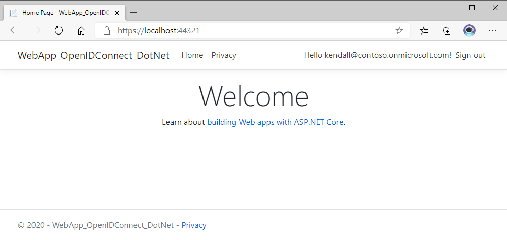 Web browser displaying the running web app and the user signed in