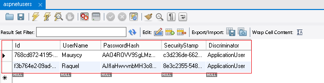 Screenshot of a s p net users table, with entries displaying I D, User Name, Password Hash, Security Stamp, and Discriminator columns.