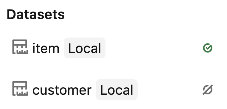 The Data tab showing a green materialization icon on one dataset and a deselected icon on another.