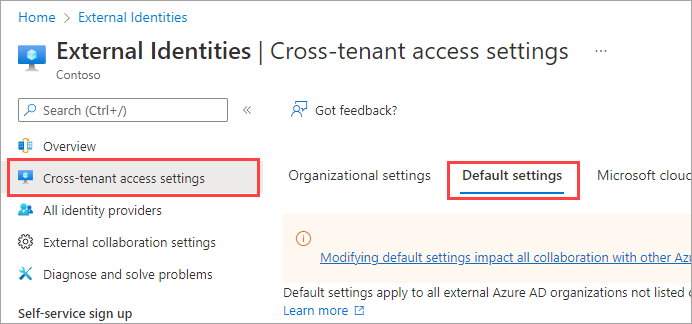 Screenshot showing the tenant restrictions section on the default settings tab.