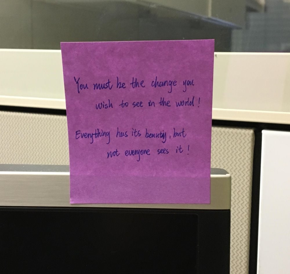 Photo of a sticky note with writing on it.