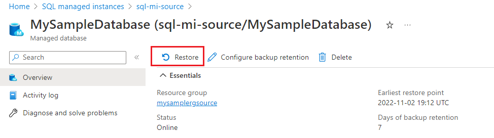 Screenshot that shows a database overview pane in the Azure portal, with the Restore button highlighted.