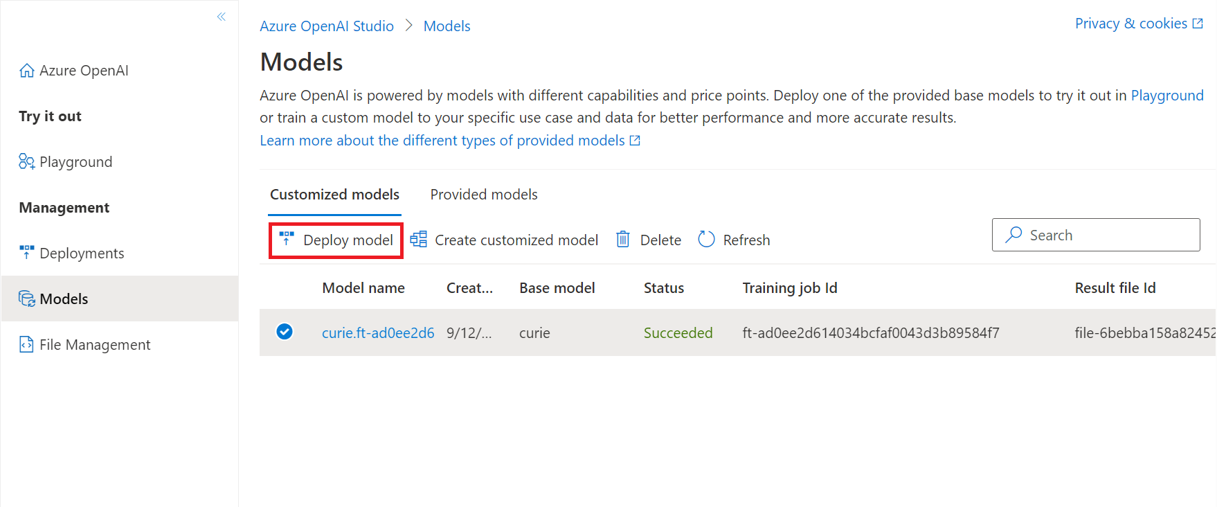 Screenshot of the Models page from Azure OpenAI Studio, with the Deploy model button highlighted.