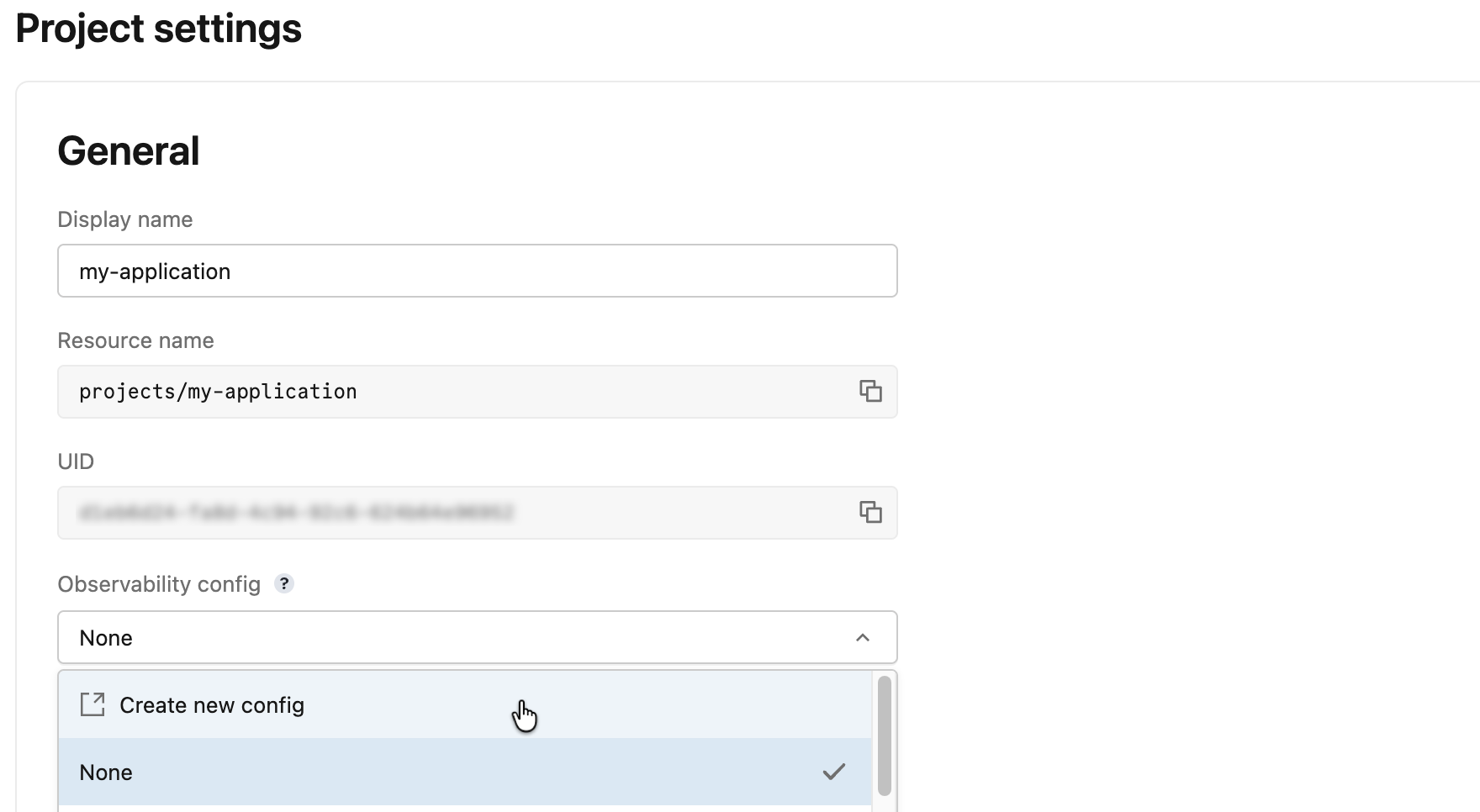 The Create observability config panel, showing the configuration name, the Use user-level credentials identity option, the Unity Catalog catalog and schema destination, and the Enable insights toggle.
