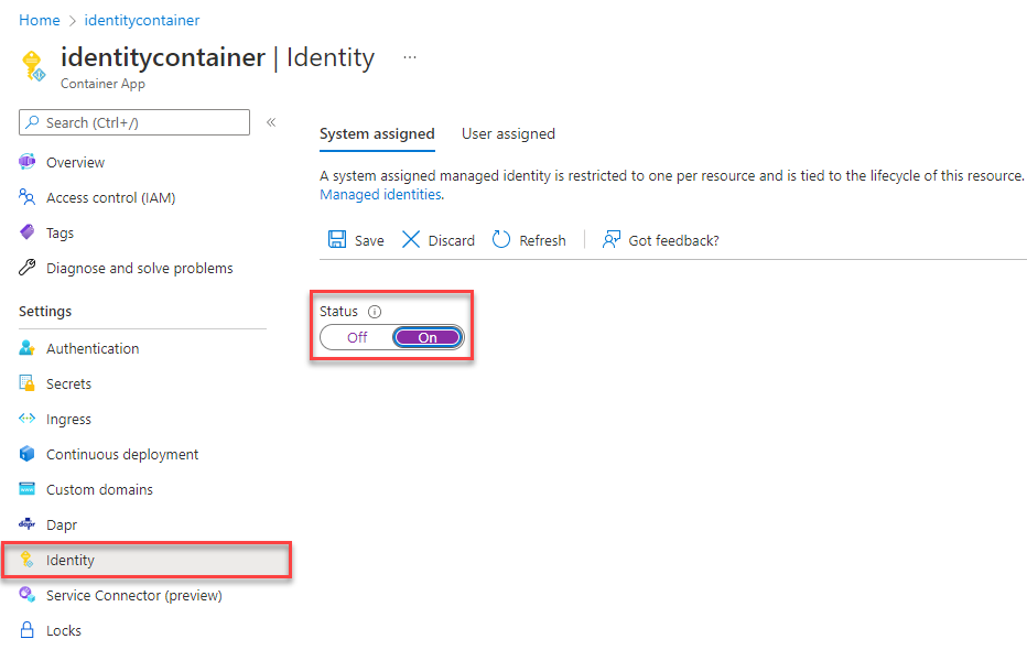 Screenshot of Azure portal Identity page of Container App resource showing System assigned tab with Status field highlighted.
