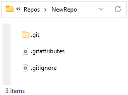 Screenshot of the new repository folder in Windows File explorer showing a .git folder, a .gitignore file, and a .gitattributes file.