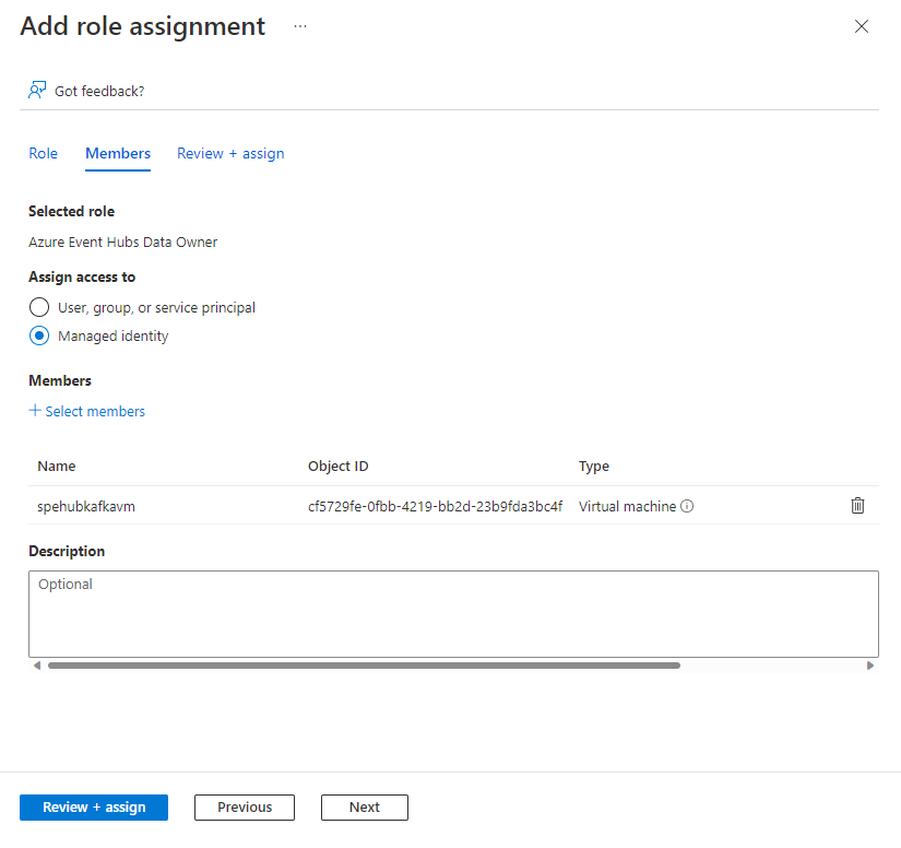 Screenshot showing the Add role assignment page with role assigned to VM's managed identity.