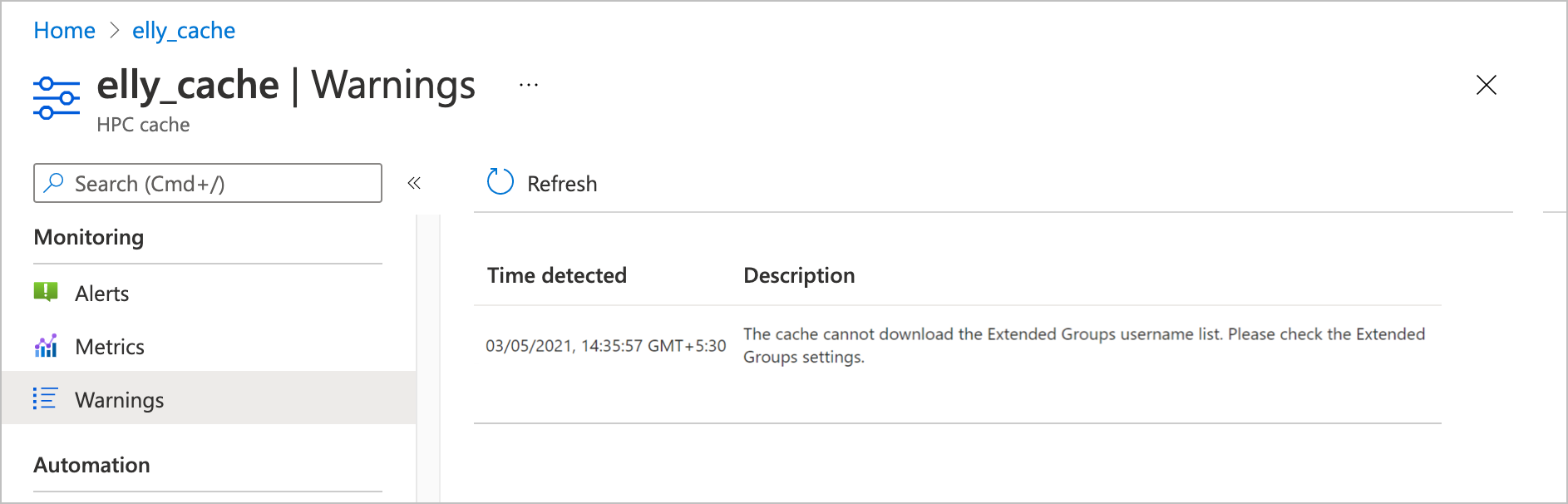 screenshot of the Monitoring > Warnings page showing a message that extended groups usernames could not be downloaded