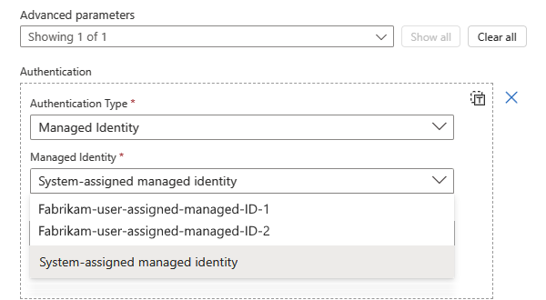 Screenshot shows Standard workflow, example built-in action, and selected managed identity selected to use.