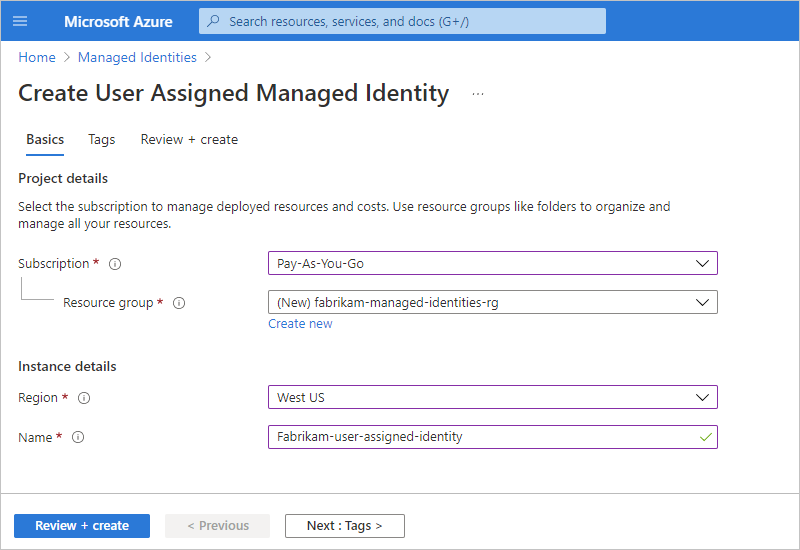 Screenshot shows page named Create User Assigned Managed Identity, with managed identity details.
