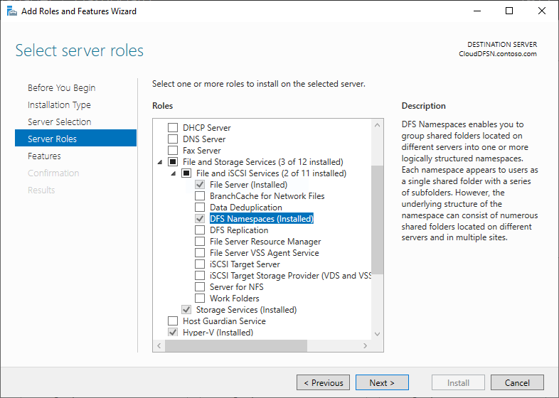 A screenshot of the Add Roles and Features wizard with the DFS Namespaces role selected.