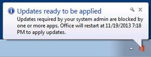 A screenshot of a notification indicating that updates required by the system admin are blocked by one or more apps, with a specific time for Office restart.