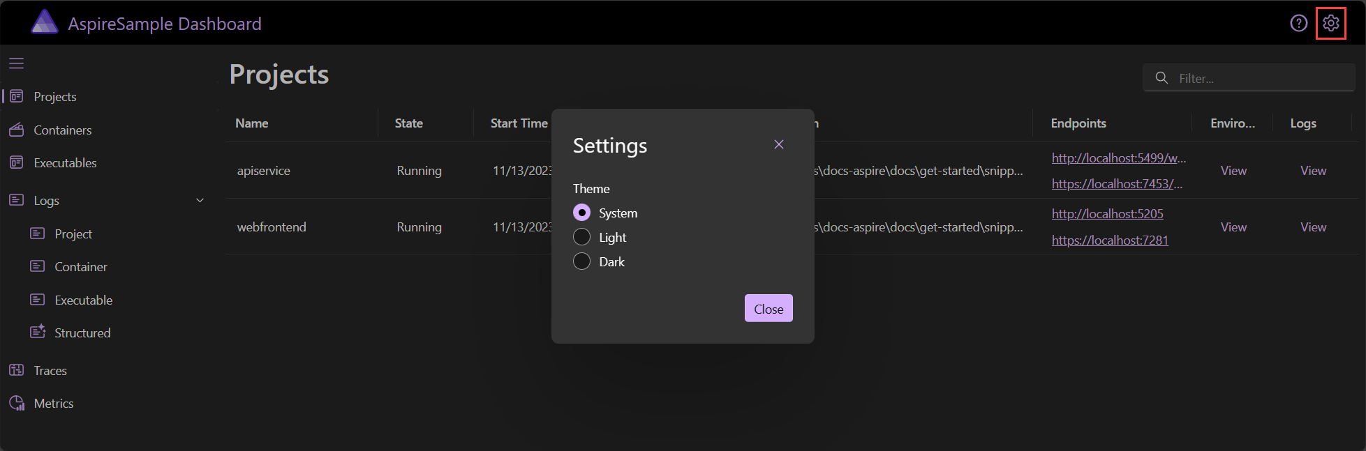The .NET Aspire dashboard Settings dialog, showing the System theme default selection.