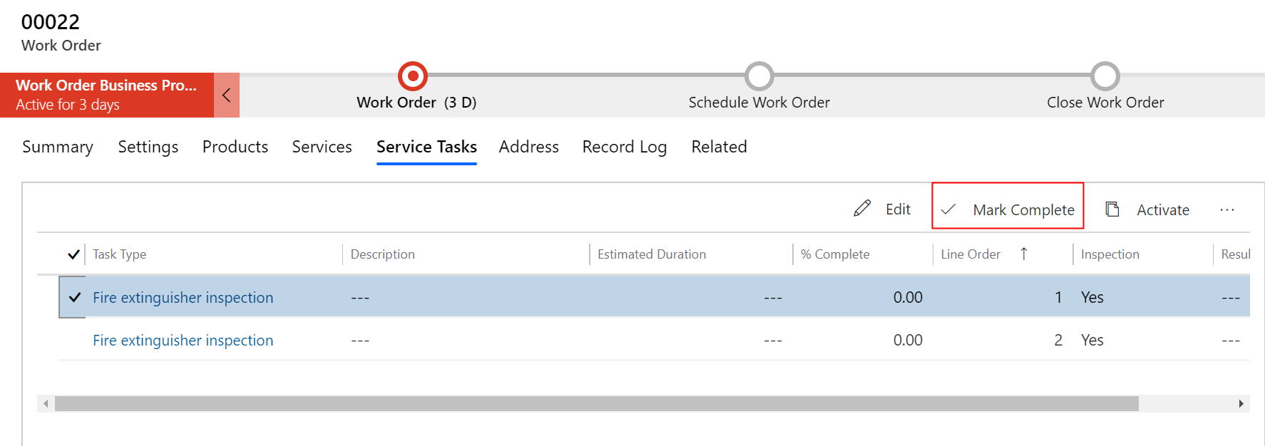 Screenshot of marking work order service task as complete from work order service task grid view.