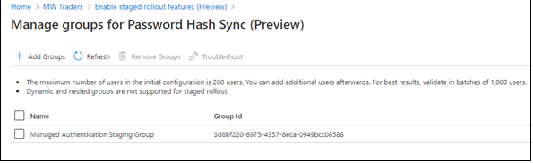 Screenshot of the Manage groups for Password Hash Sync page in the Microsoft Entra admin center. A group is in a table.