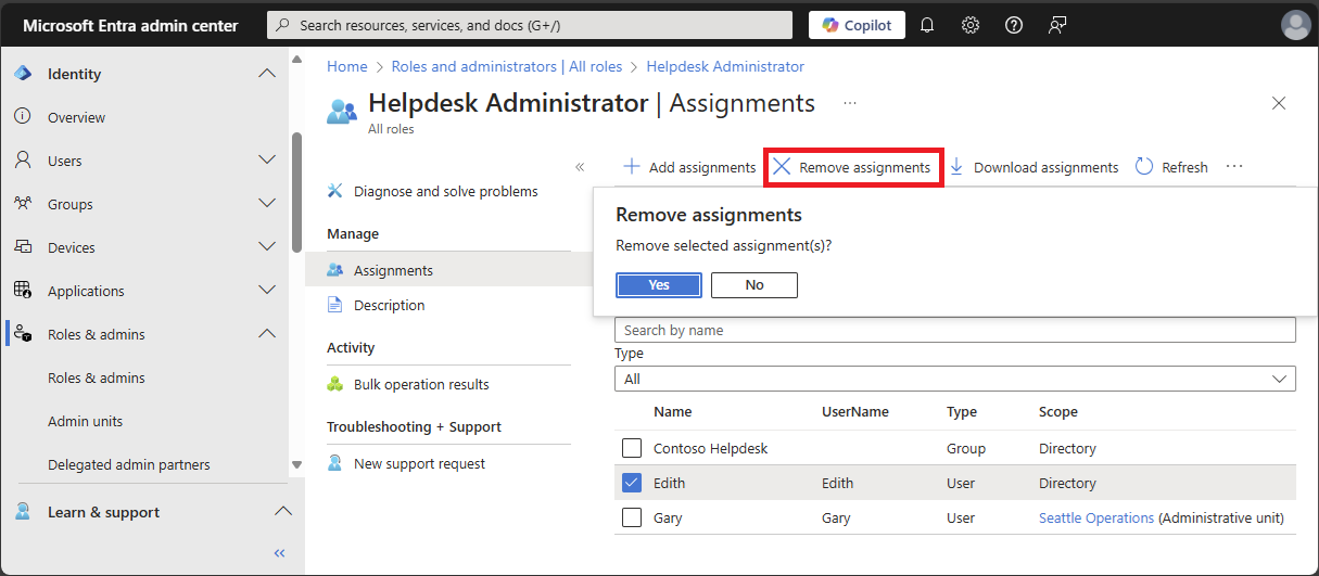 Remove a role assignment from a selected group.