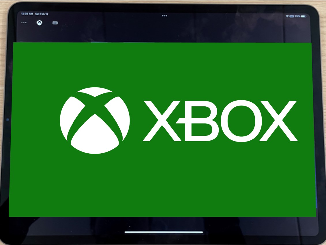 The Xbox logo on a landscape tablet, with black bars on the top and bottom