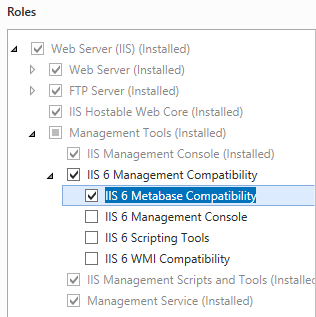 Screenshot of the Roles dialog box. I I S 6 Metabase Compatibility is highlighted.