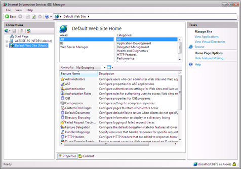 Screenshot of the I I S Manager screen showing the updated Default Web Site Home page in the main pane.