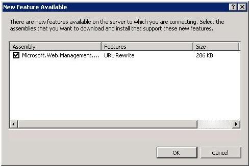 Screenshot of New Feature Available dialog box showing selected I I S Manager extension modules.