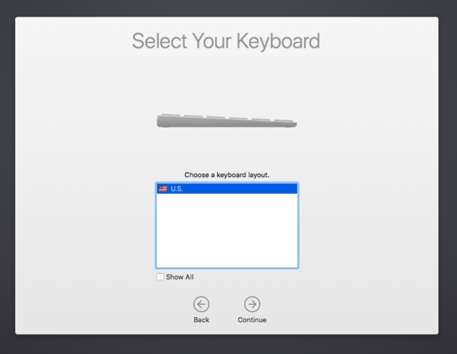 Screenshot of macOS device Setup Assistant Keyboard Layout screen, showing a list of keyboard languages to select from, an unchecked Show All option, and a Back and Continue button.