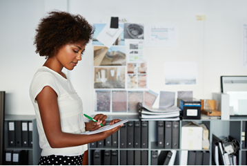 Image of a generic business person in an office setting.