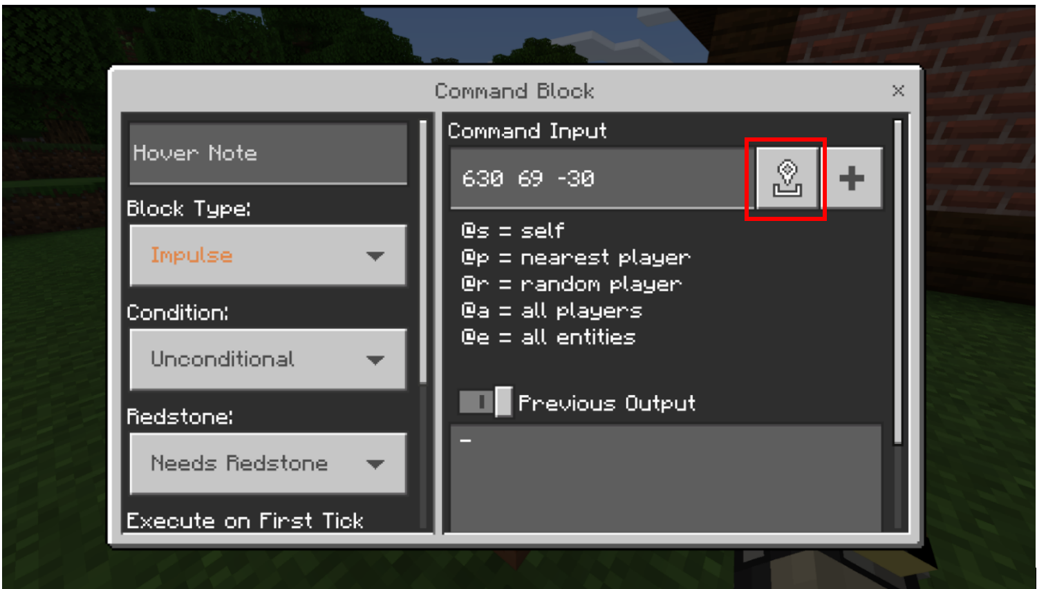 Image with the paste button highlighted in a command block dialog