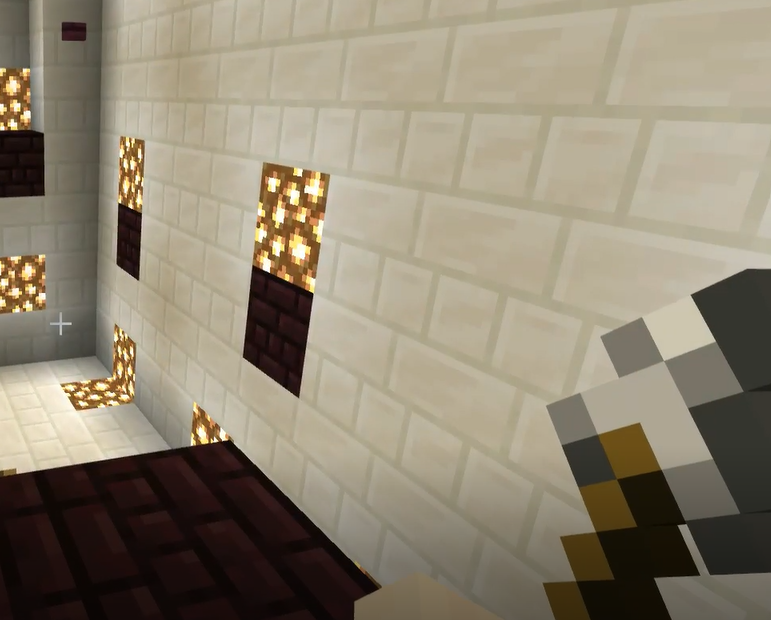The sample parkour map's Redstone challenge to hit a button with an arrow